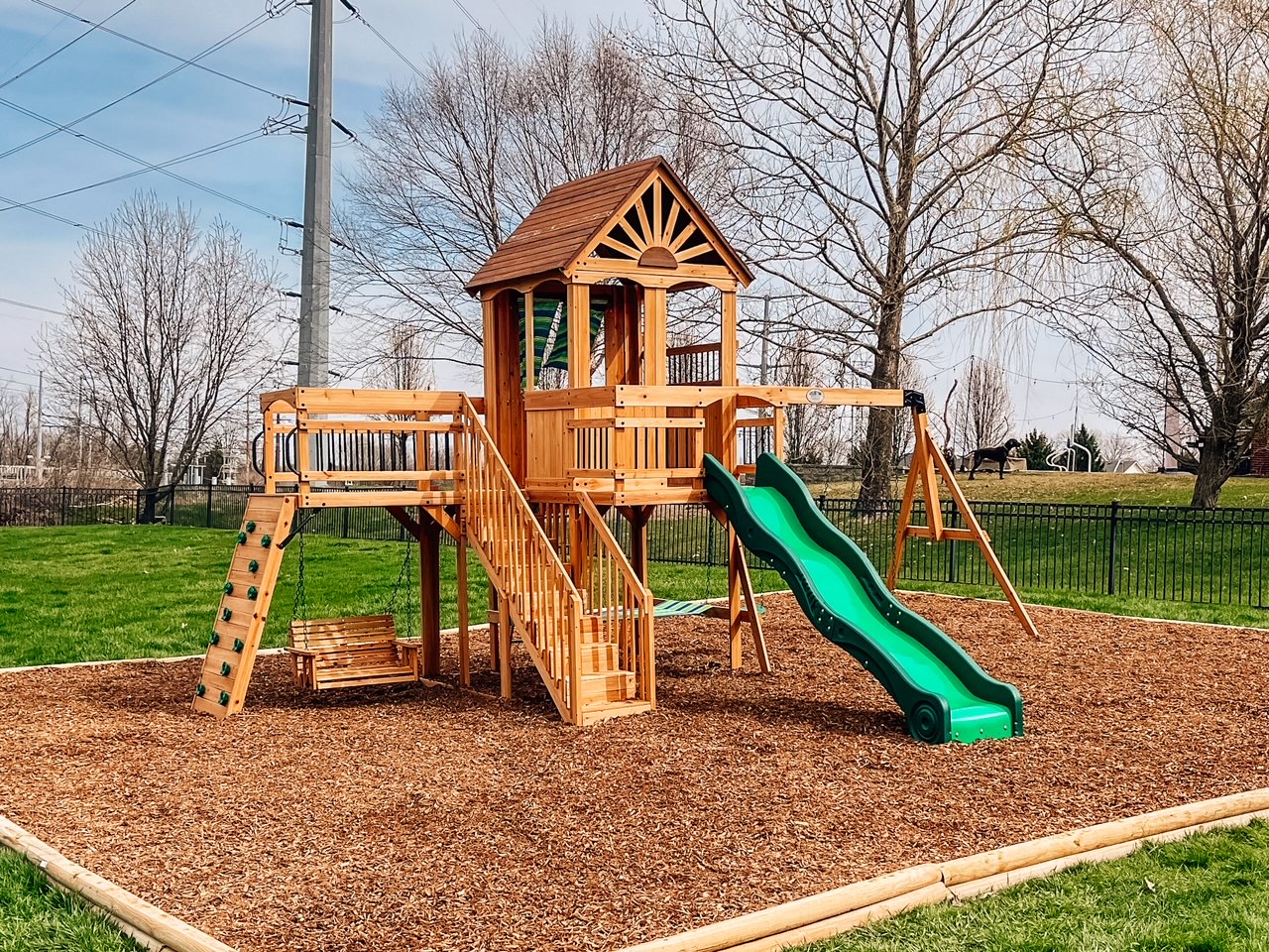 Custom backyard playground installed in Indiana by JMSC Build & Play