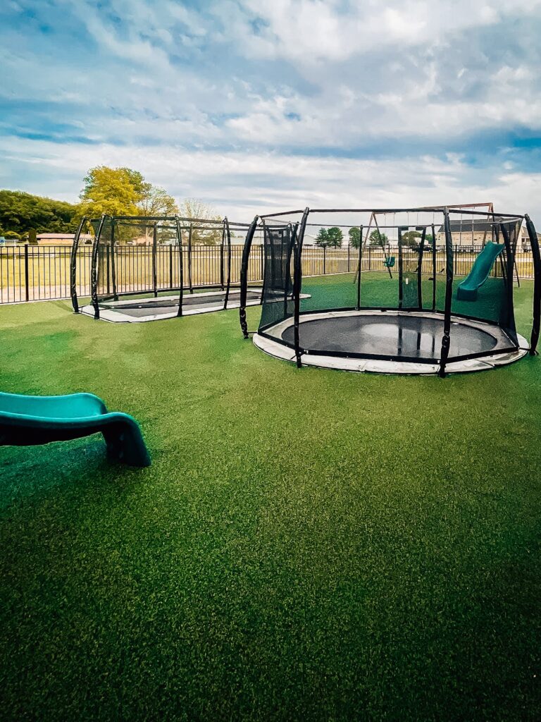 Family compound playground installation in Lakeville, Indiana, designed by JMSC Build & Play