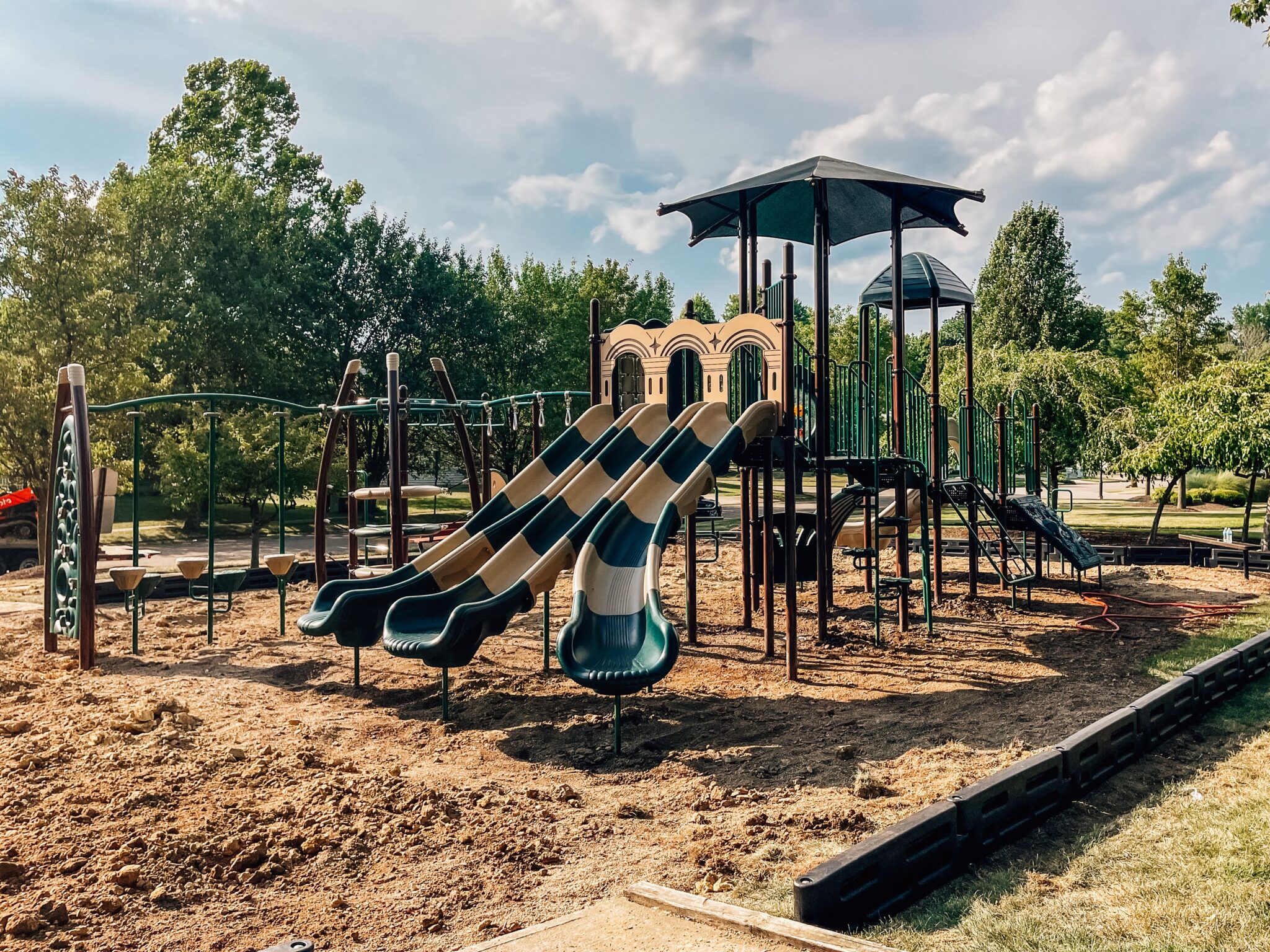 Various playground equipment at Coconut Grove Playground in Shayler Crossing, Batavia, Ohio