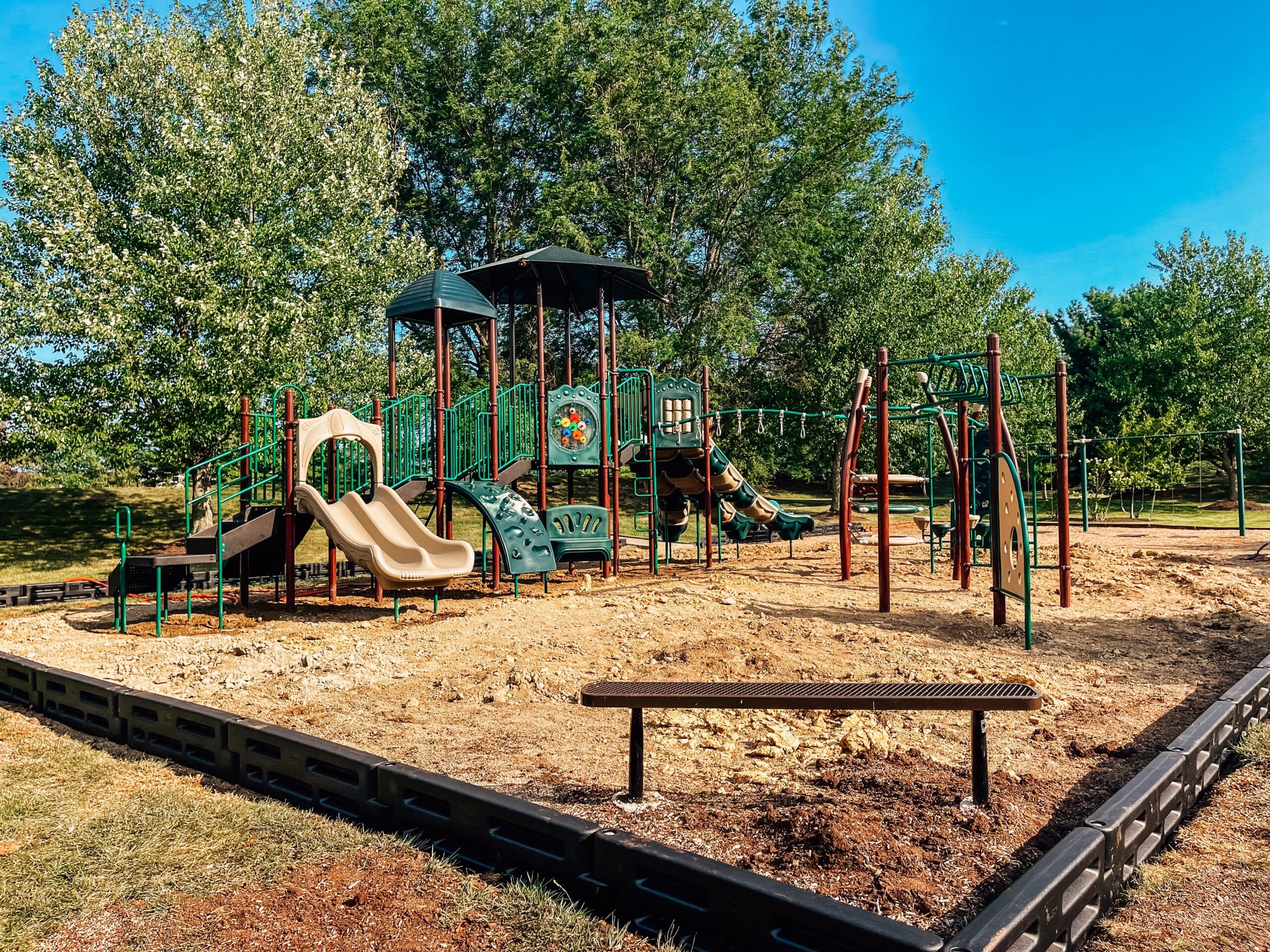 Interactive play panels at Coconut Grove Playground in Shayler Crossing, Batavia, Ohio