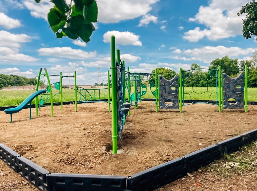 Columbia Hills Fitness Climber showing various climbing obstacles, ropes, and rock walls from a wide angle