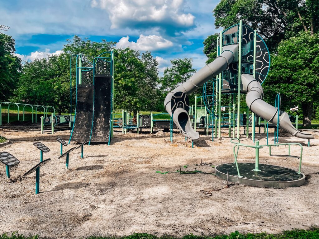 Inclusive merry-go-round at wheelchair accessible playground in Bloomington, IN