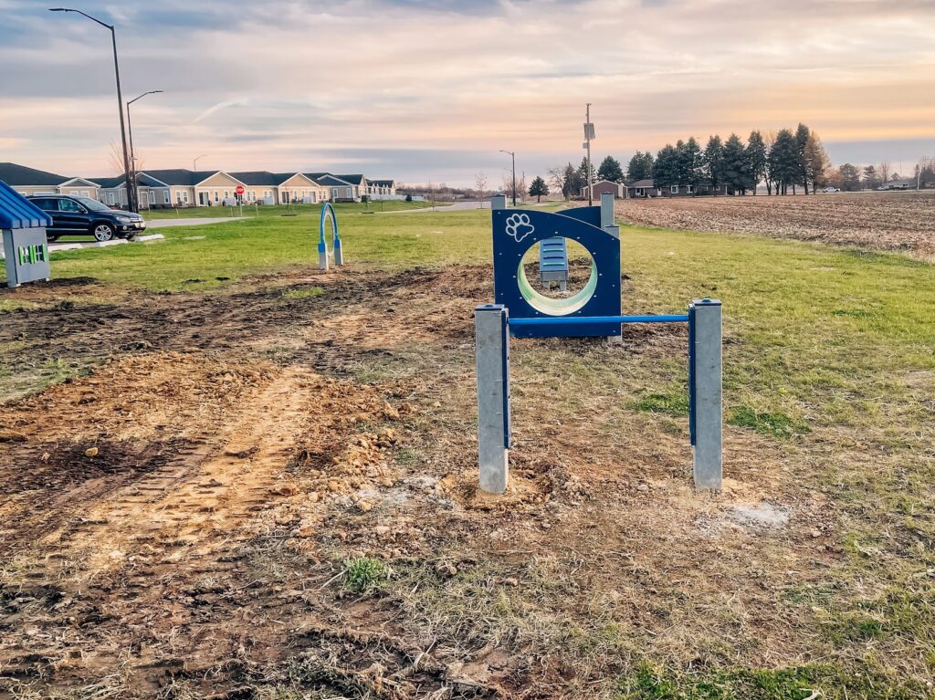 Commercial-grade jump obstacles in a dog park installed in Kenosha, Wisconsin.