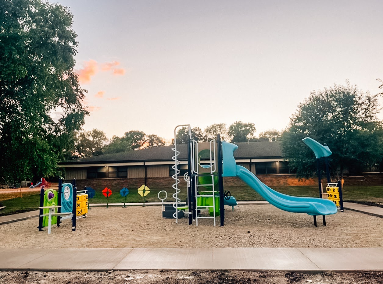 Flower-shaped outdoor music instruments installed in a Lewistown playground.