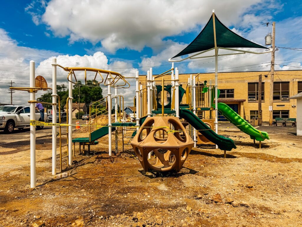 Commercial monkey bars installed in a playground in Troy, Ohio.
