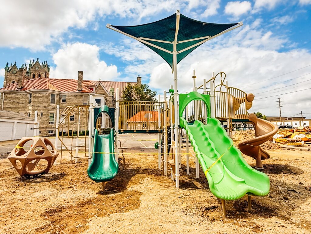 Close-up view of a commercial-grade playground slide in Troy, Ohio.