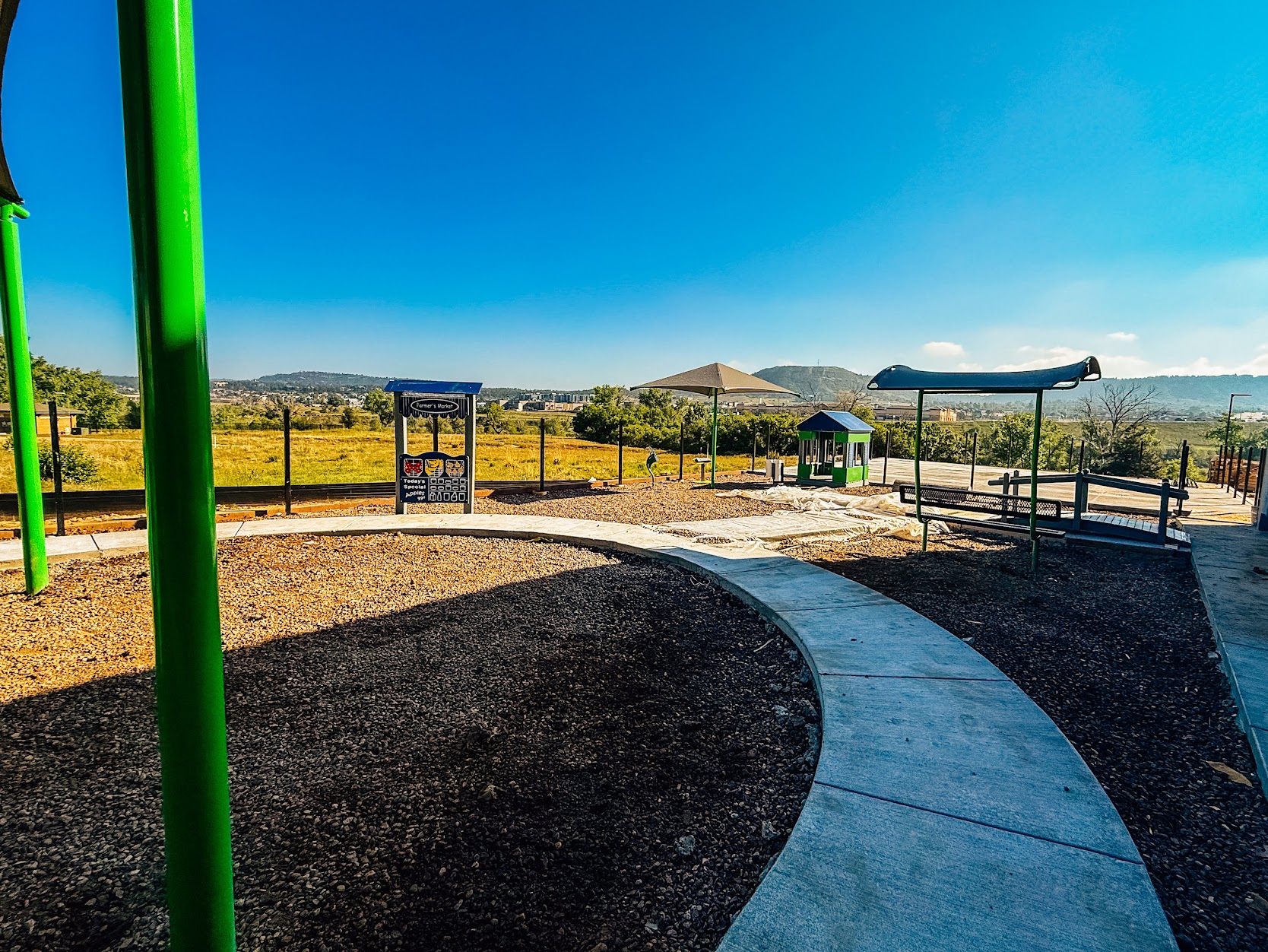 Open-ended city-themed imaginative play structure at Kiddie Academy playground in Castle Rock.