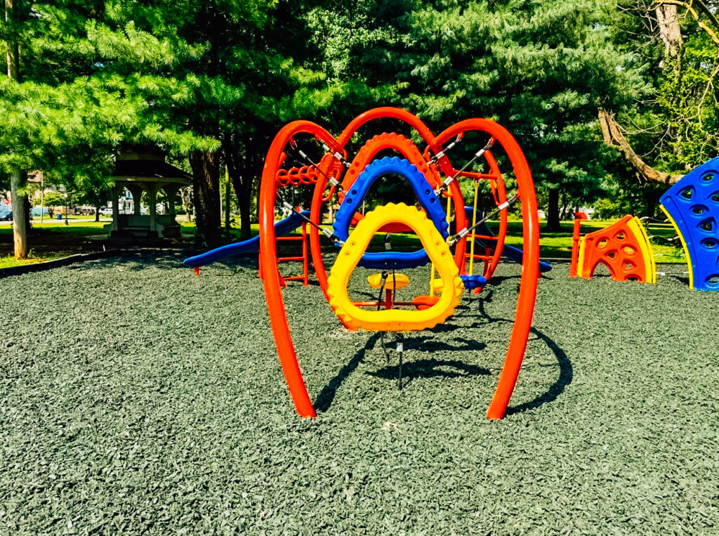 Commercial playground slide structure in Cairo, Illinois, part of a multi-featured play system.